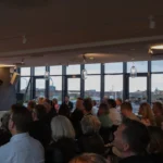 Participants listening during the quarterly event